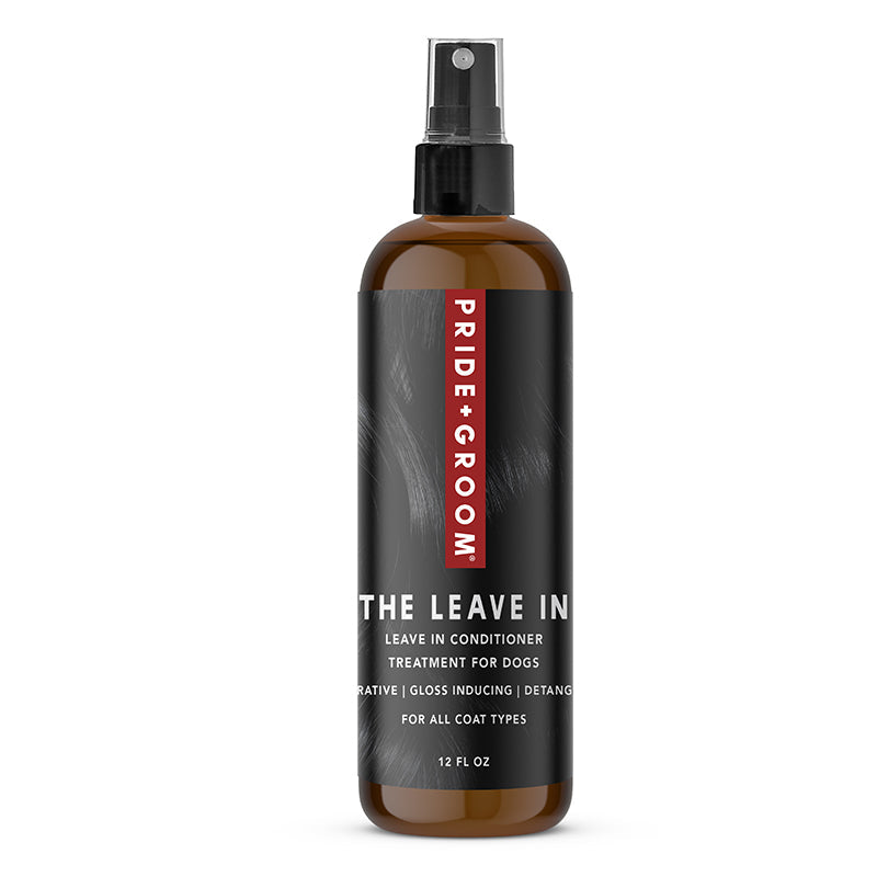 Dog leave-in conditioner spray bottle with black pump, amber brown bottle.
