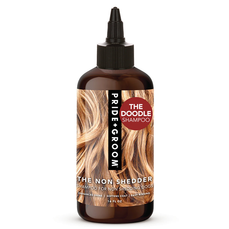 Dog shampoo bottle with black dropper cap, brown label with blonde hair artwork