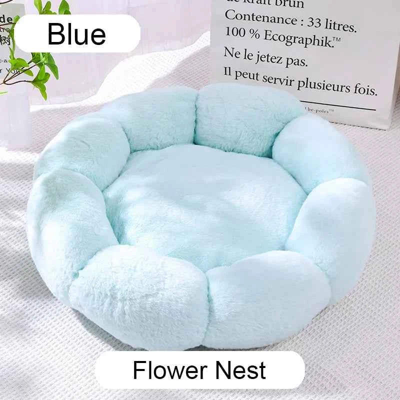 Blue plush donut pet bed with round nest; cushioned inner pad and raised side bolsters