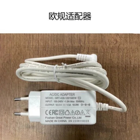 AC/DC power adapter with white power cord for automatic cat litter box