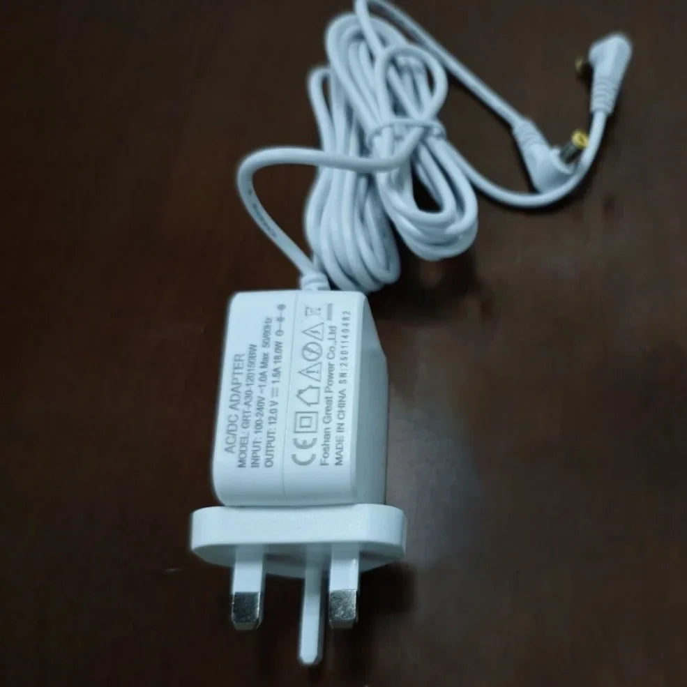 Power adapter plug with attached white cord for cat litter accessories