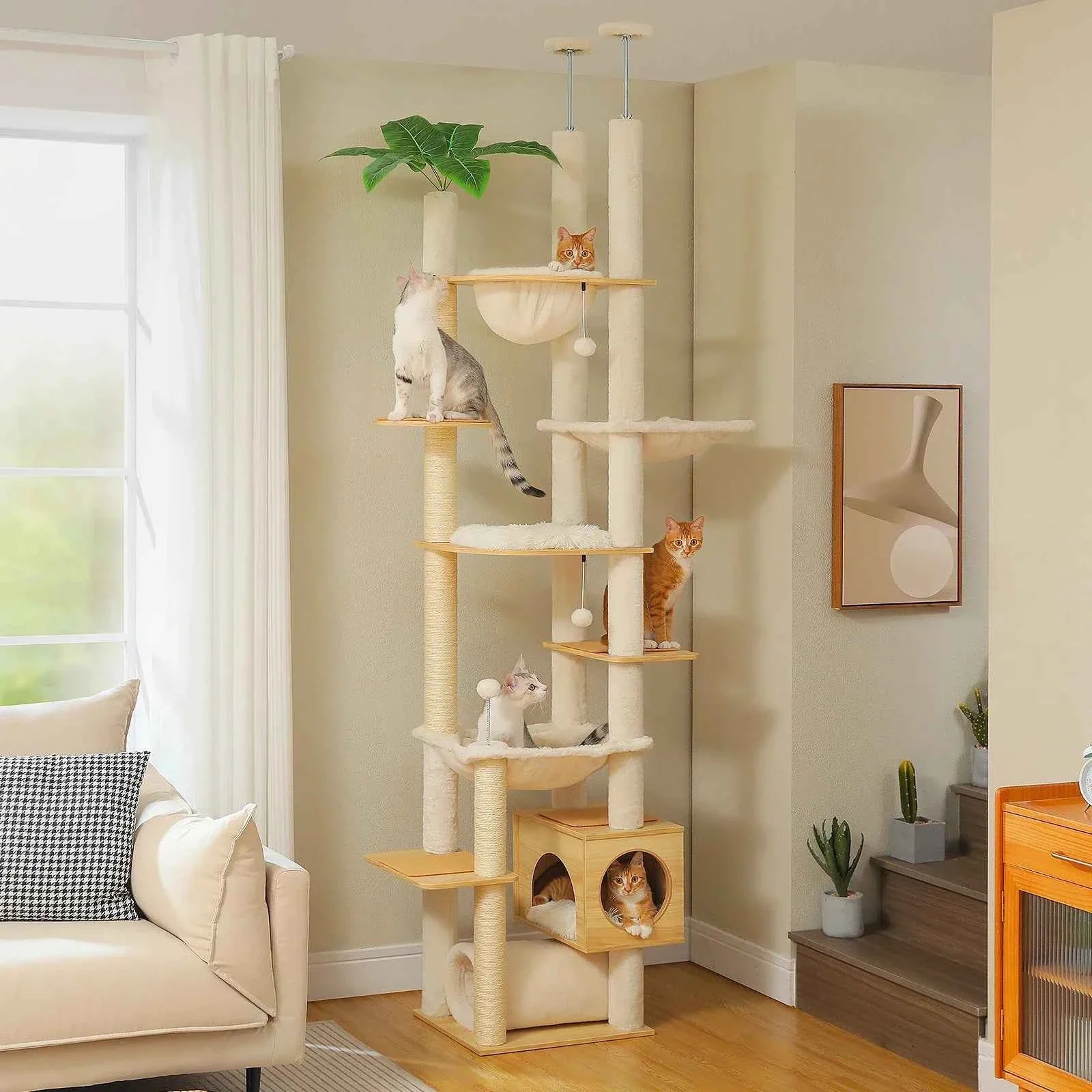 Multi-level floor-to-ceiling cat tree with hammock and round sisal scratching posts