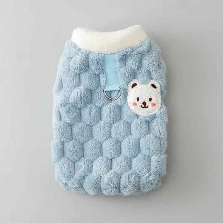 Solid blue fluffy cat sweater vest with white collar and bear-face applique