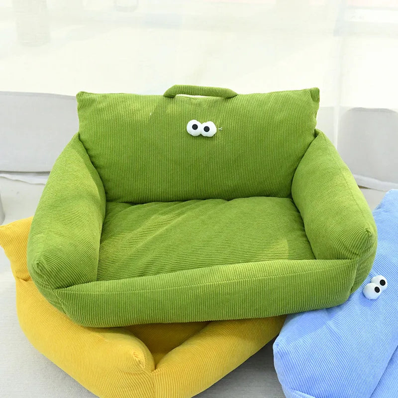 Green plush pet sofa bed cushion with striped texture, seat, and face patch