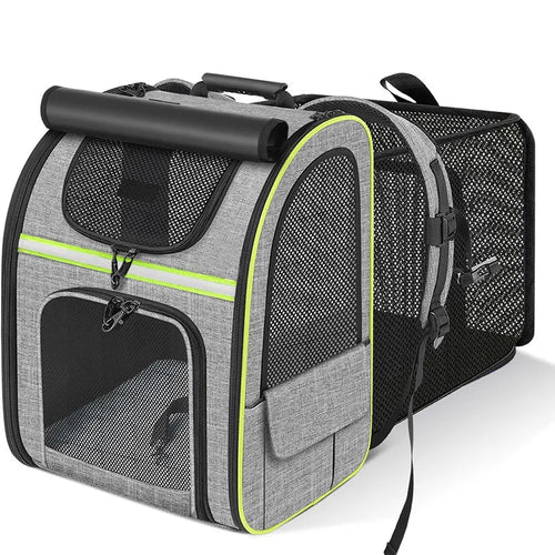 Gray expandable cat carrier backpack with neon green piping, mesh windows, and front zipper