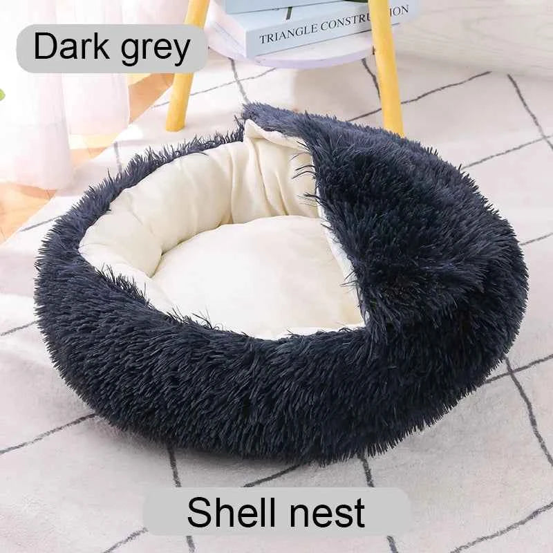 Dark grey shaggy shell-style donut pet bed with open round center and padded inner cushion