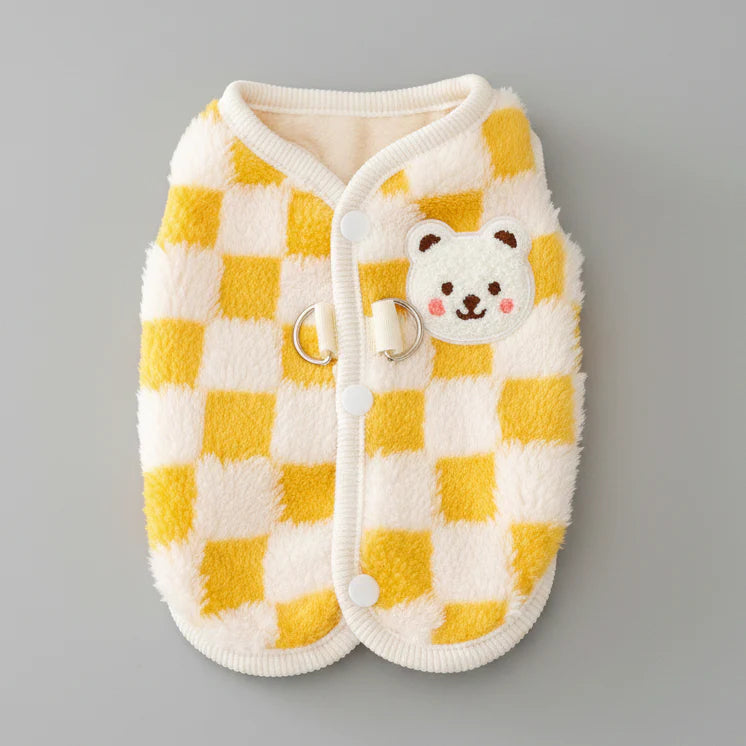 Plaid yellow cat sweater vest with cream trim, button front, and bear face pocket