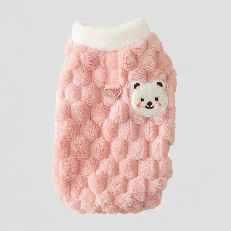 Solid pink fuzzy cat sweater vest with white collar and bear-face pocket