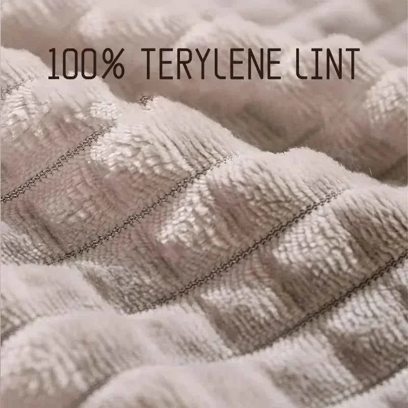 Close-up of grey textured fabric panels on a pet bed mat cushion