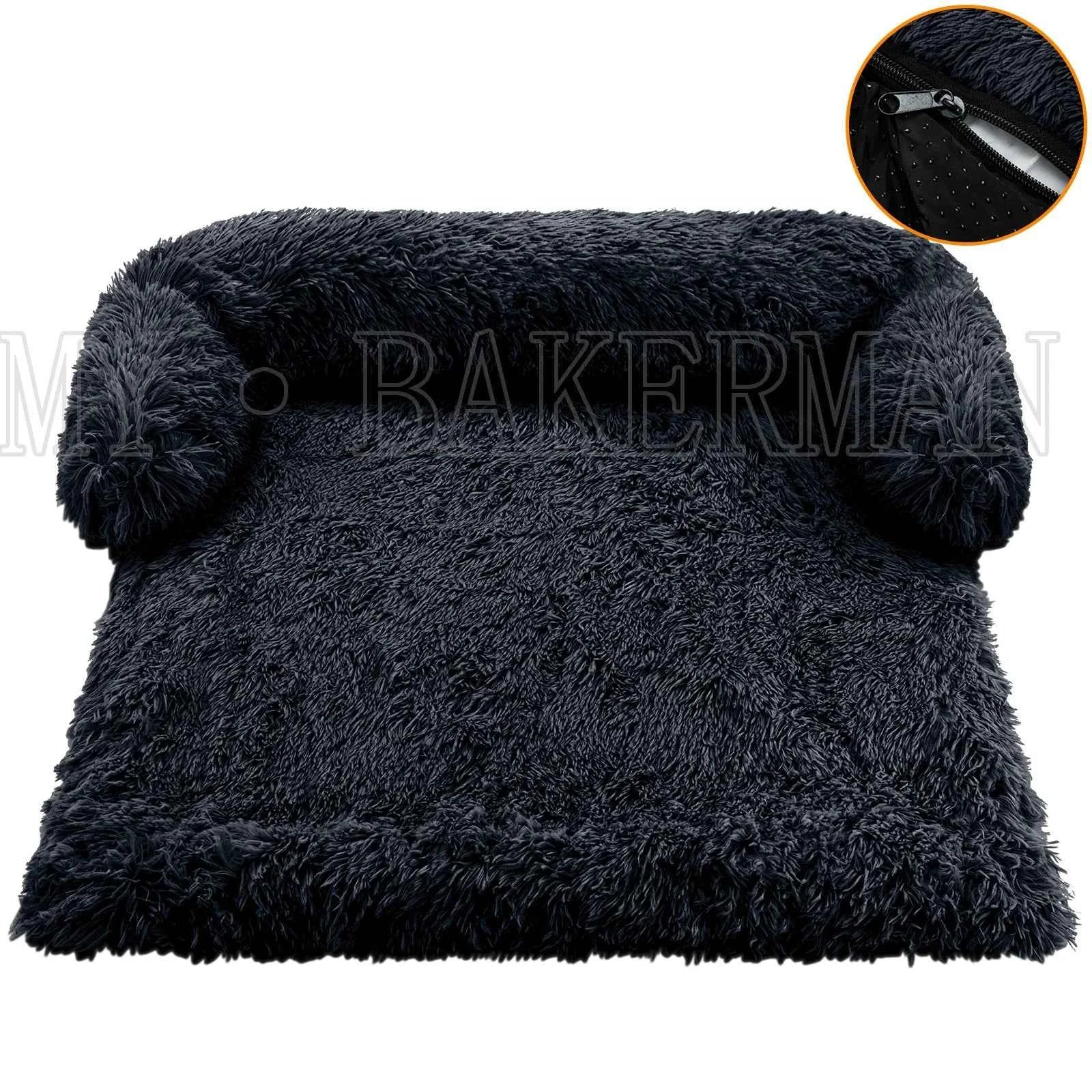 Dark gray plush sofa-style dog bed with zipper closure and cushioned bolsters