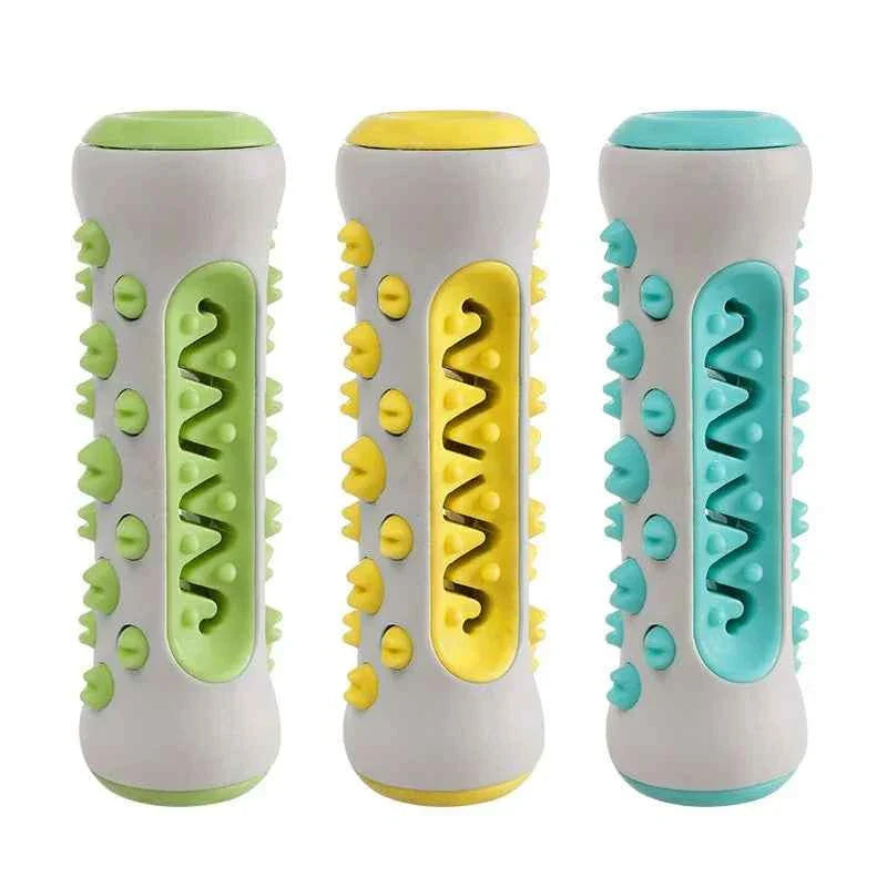 Chew-resistant rubber dental dog toy in green, yellow, and teal color options