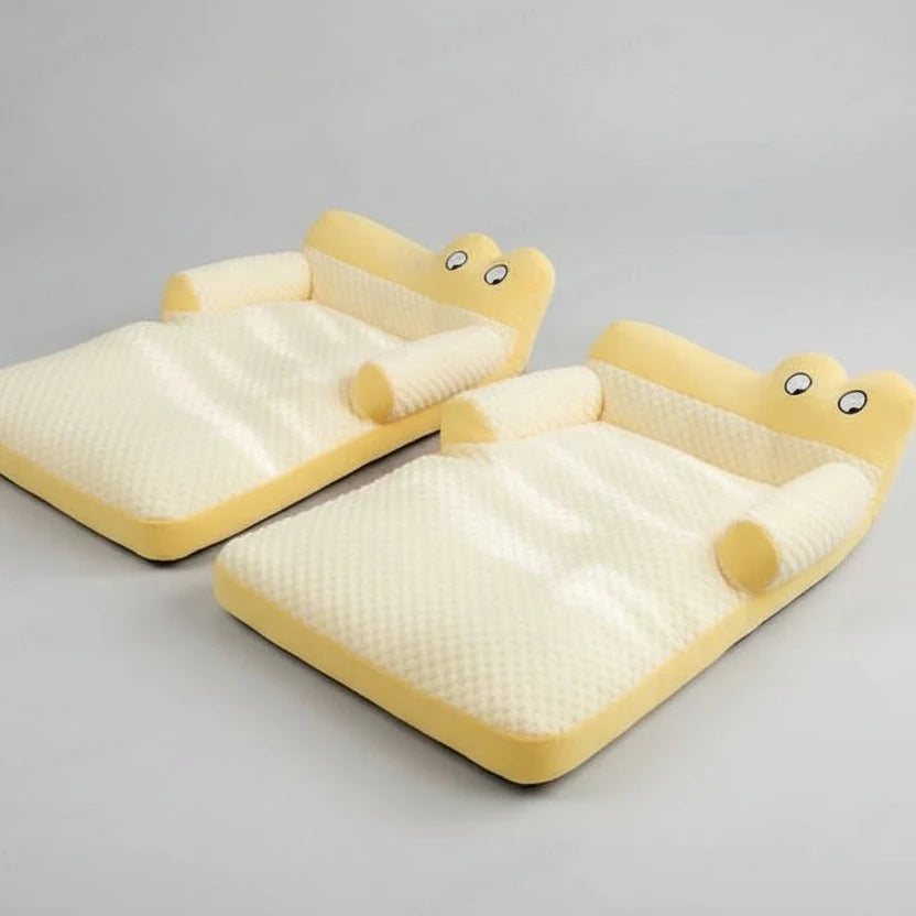 Rock yellow pet sofa bed with backrest and cream textured seat pads, laid out