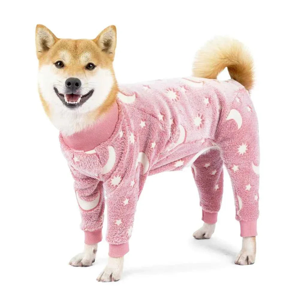 Pink fleece dog jumpsuit pajamas with white star and bone pattern, full-body coverage