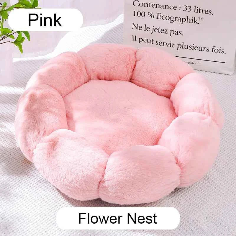 Pink plush donut pet bed with round nest; cushioned inner pad and raised side bolsters