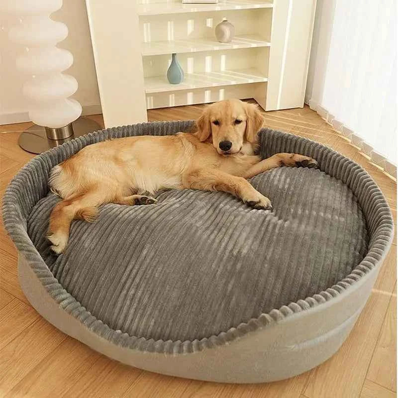 Large round dog cooling mat bed on wooden floor, gray ribbed cushion and light gray border