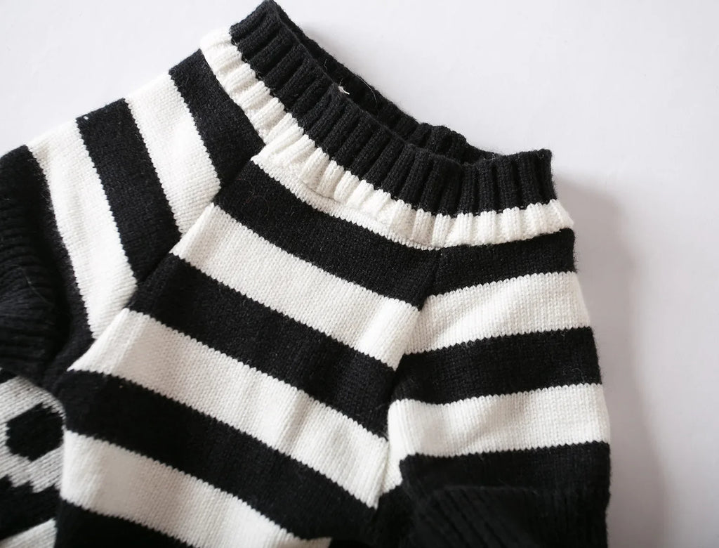 Striped knitted pet sweater in black and white, ribbed turtleneck and cuffs