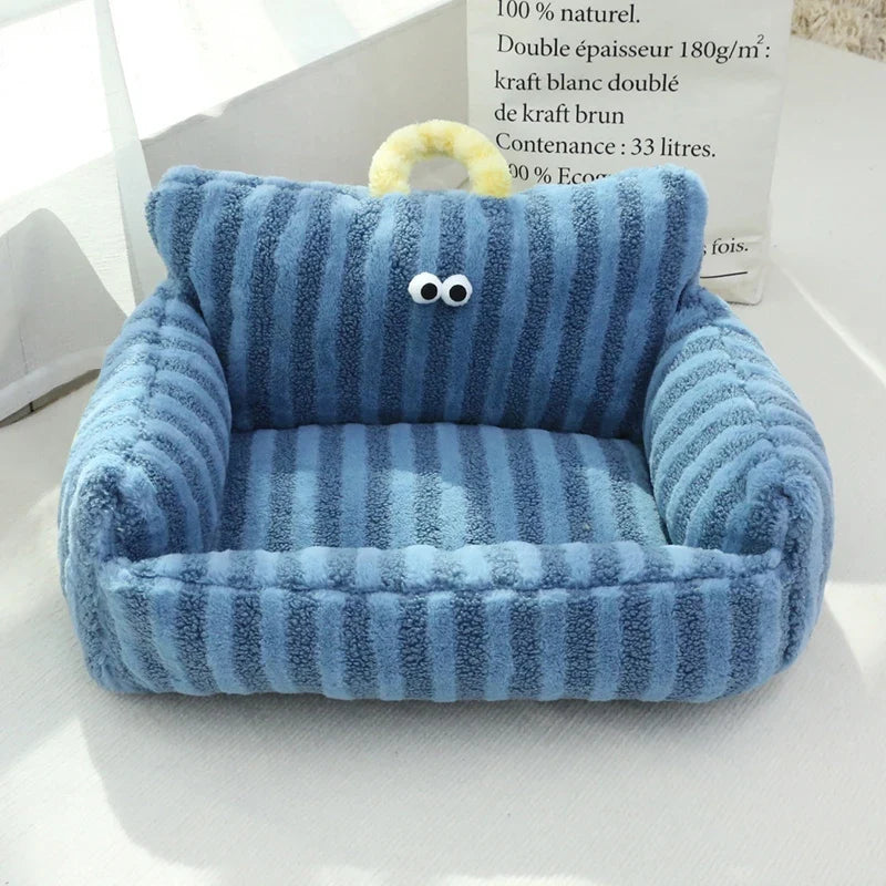 Blue striped plush pet sofa bed cushion with curled arms and face patch