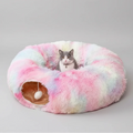 Pastel plush cat tunnel bed with two openings and hanging pom-pom toy