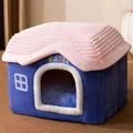 Blue foldable pet castle house with plush arched entrance and detachable padded roof