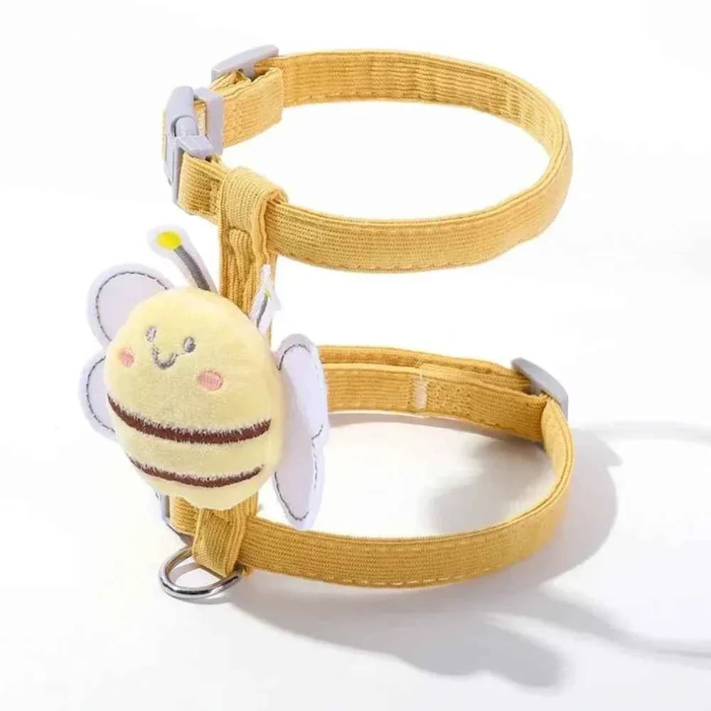 Yellow cat harness vest with bee plush charm and adjustable neck and chest straps