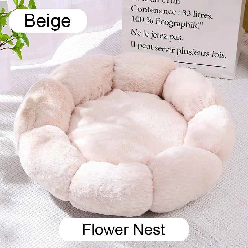 Beige plush donut pet bed with round nest; cushioned inner pad and raised side bolsters