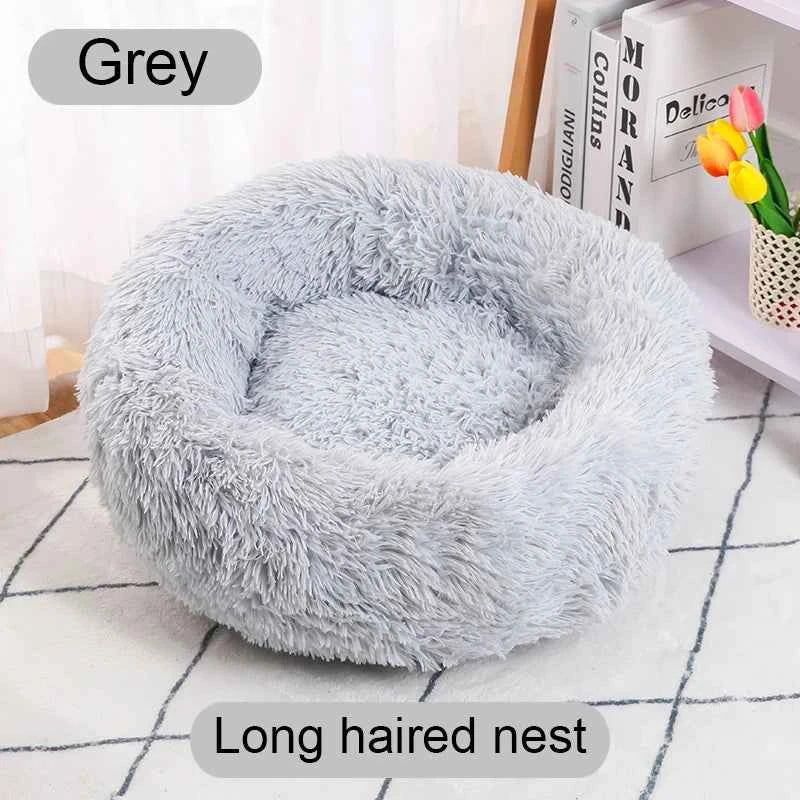 Grey round donut pet bed plush nest, shaggy long-pile fabric with cushioned center