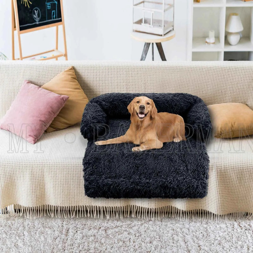 Plush sofa-style dog bed with dark gray shag cover and low padded seat
