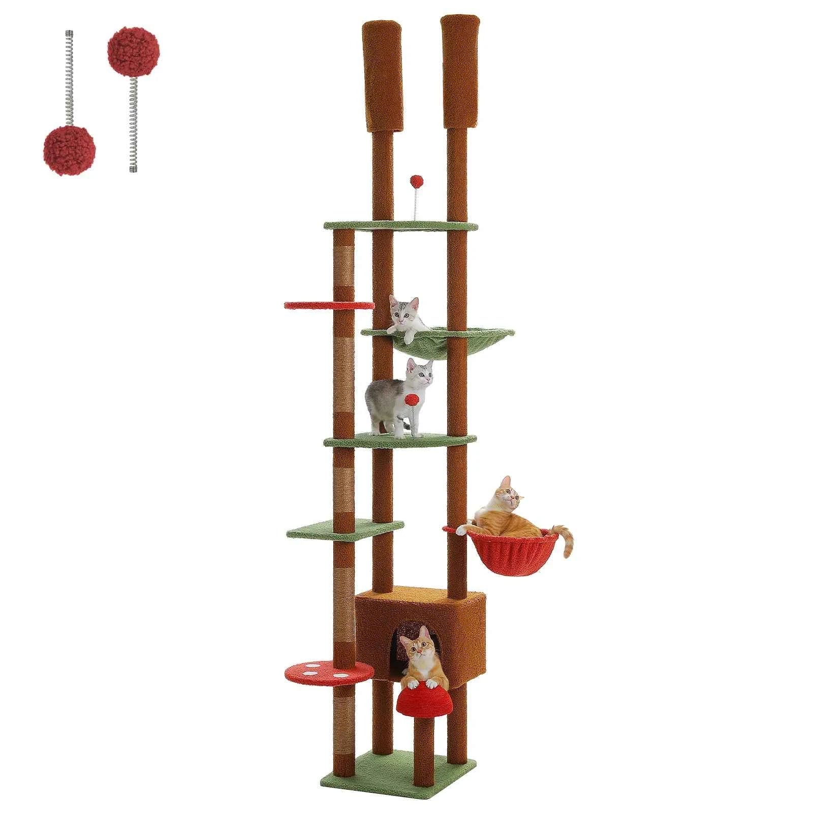 Color-block cat tree with red and green sisal posts, hanging pom toys, and hammock