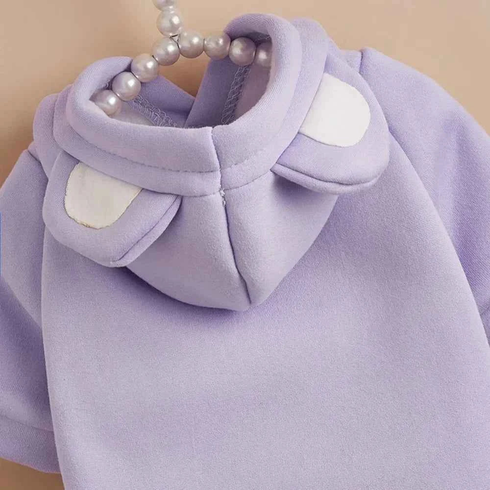 Lavender cat hoodie for hairless pets, with white ear patches and front hood pocket