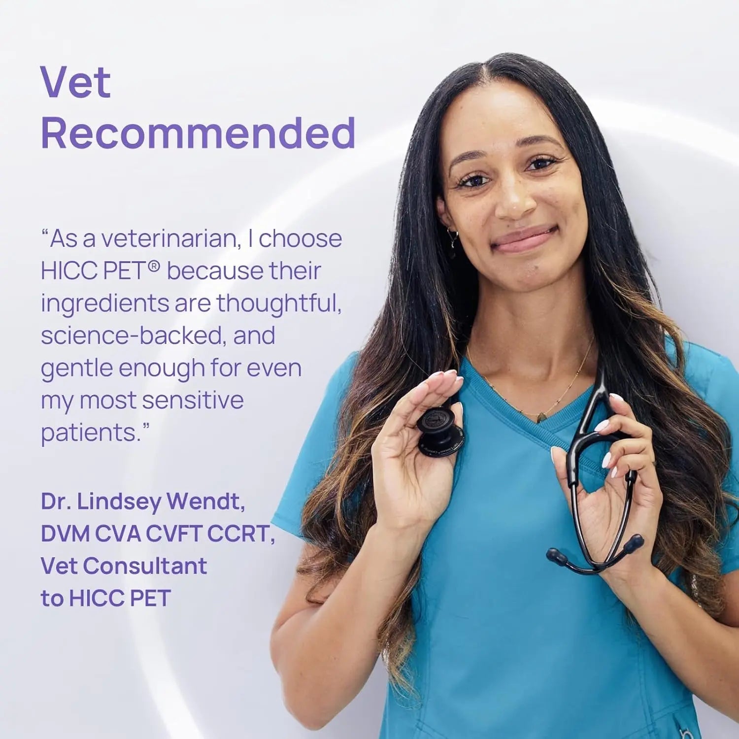 Woman veterinarian holding a small pet oral care gel tube with stethoscope.