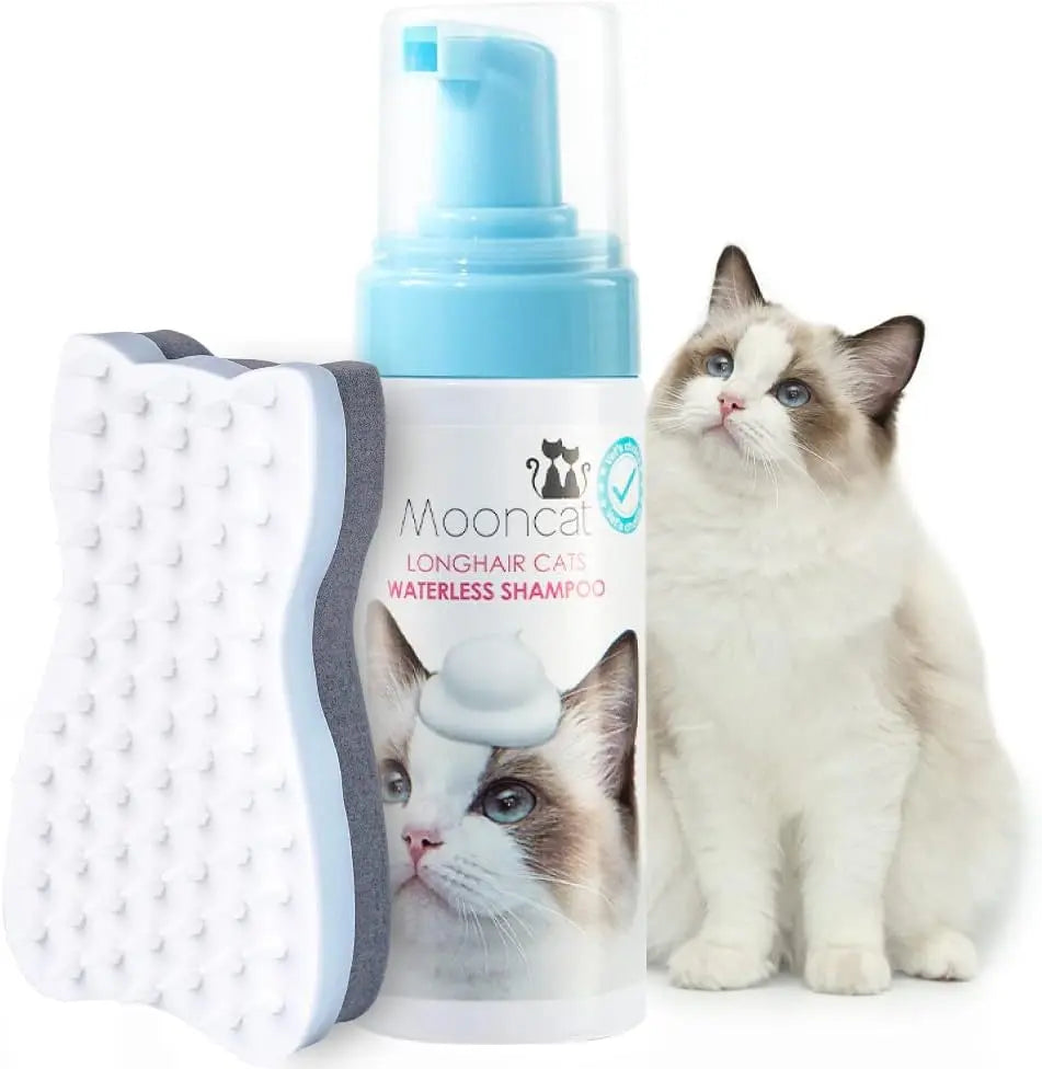Waterless cat shampoo foam bottle with brush attachment and white longhair cat