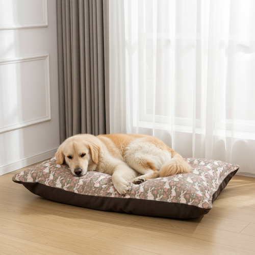 Pet bed with coral bunny print fleece cover and dark brown border, soft bolster