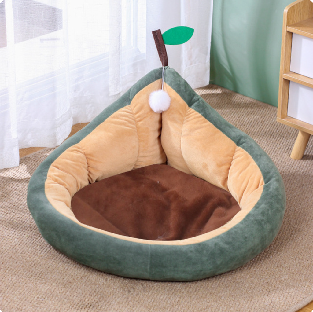 Dark green pear pet bed with beige bolster sides and brown plush base