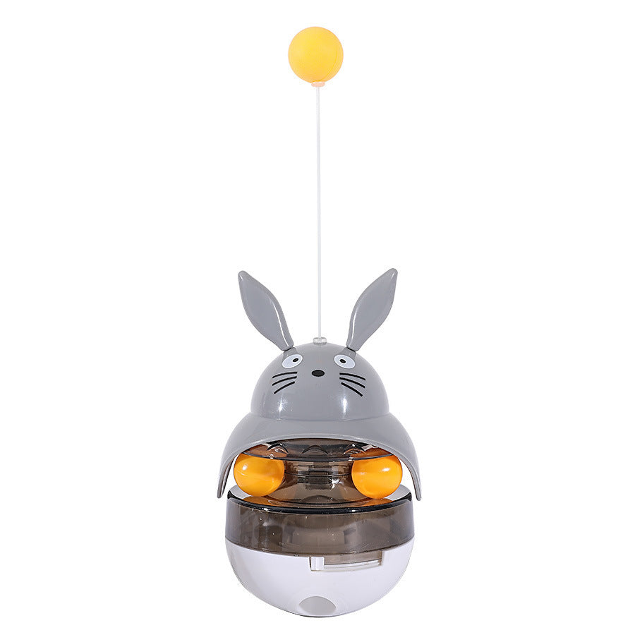 Gray bunny treat dispenser tower toy with hanging yellow ball and orange track balls