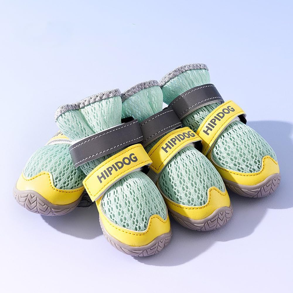 Green and yellow mesh dog boots with two side Velcro straps and gray soles