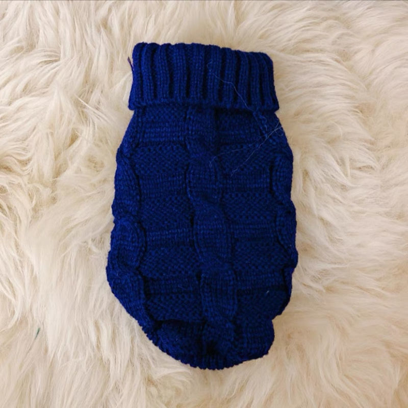 Blue knitted cat sweater with ribbed turtleneck and textured block pattern