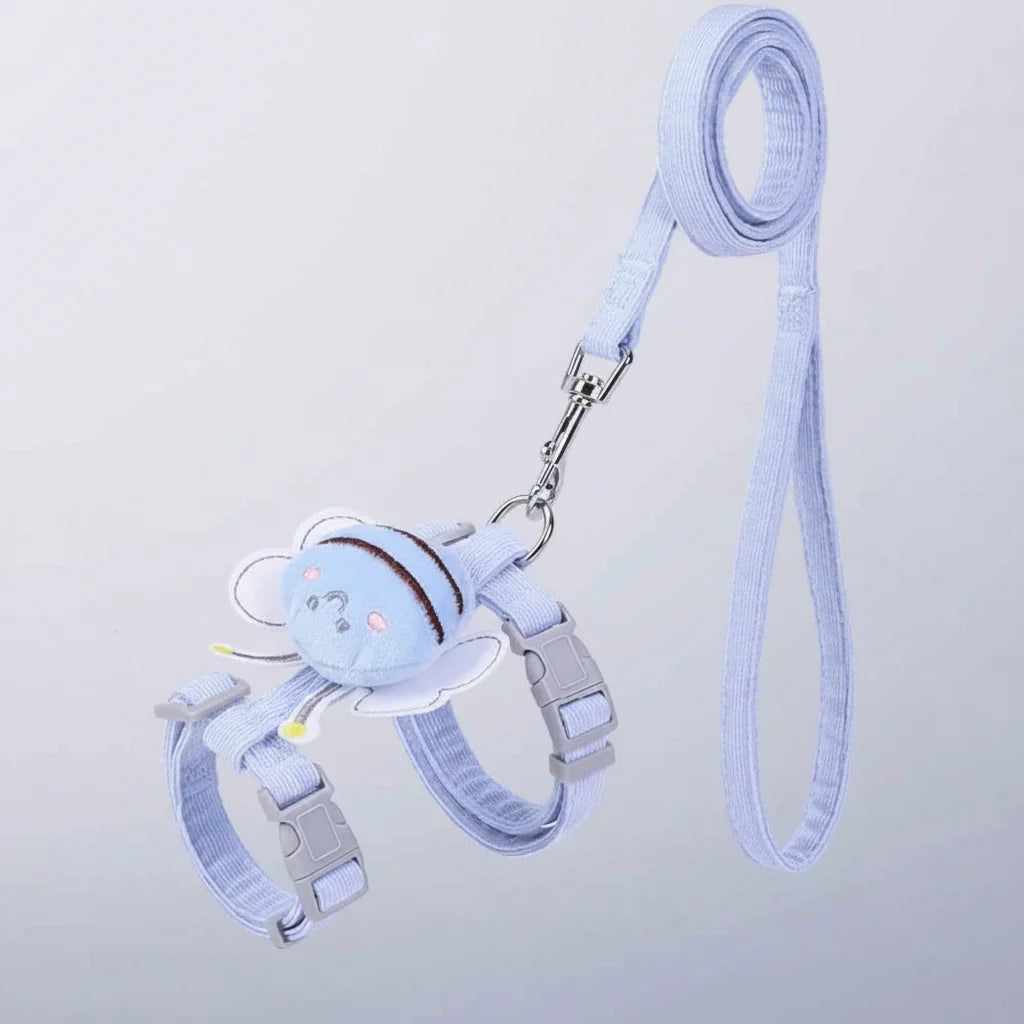 Blue bee-themed cat harness vest with adjustable straps and matching leash