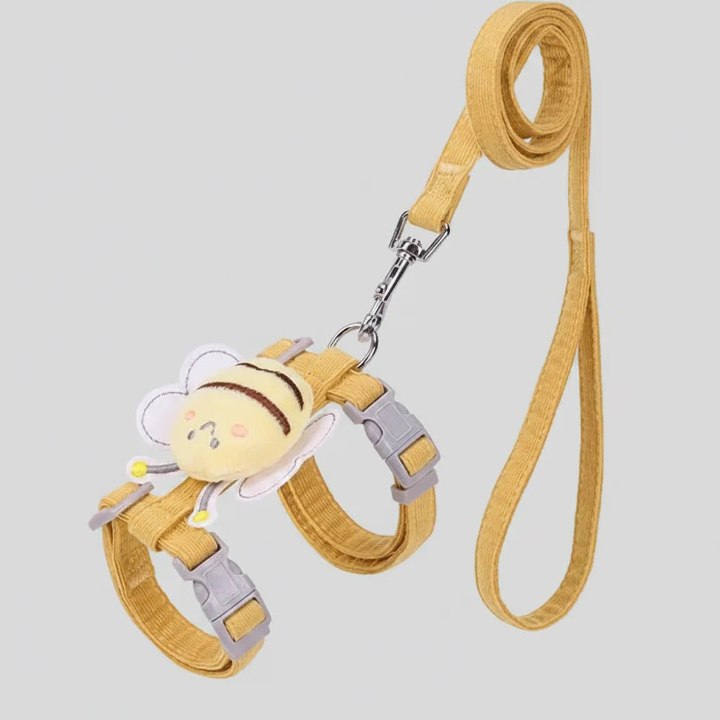 Yellow bee-themed cat harness vest with adjustable straps and matching leash