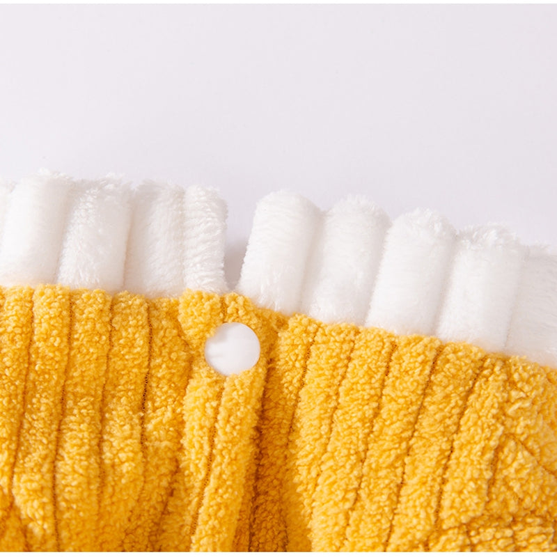 Yellow ribbed fleece pet jumpsuit with textured white ruffle collar and button detail