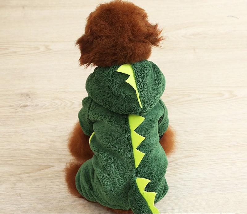 Back view of green dinosaur dog costume with yellow spike stripe
