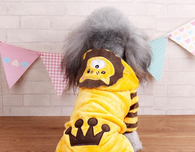 Yellow lion-style dog costume with brown crown applique