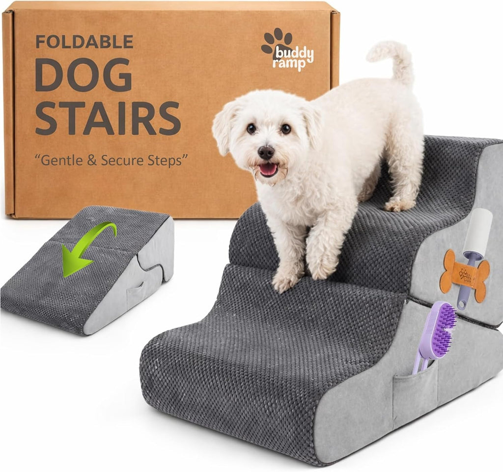 Foldable gray dog ramp with foam steps and non slip textured surface; white dog on top step