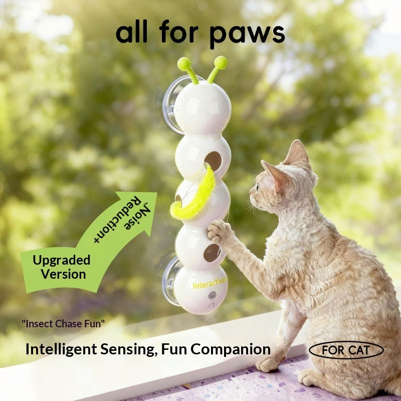 White cat teaser rod with green antenna and yellow fuzzy wand, cat playing