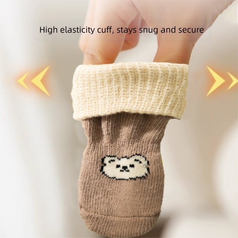 Pair of brown dog socks with a white bear knit patch and ribbed cuffs