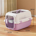 Airline-approved pet carrier crate with purple accents and wire front door