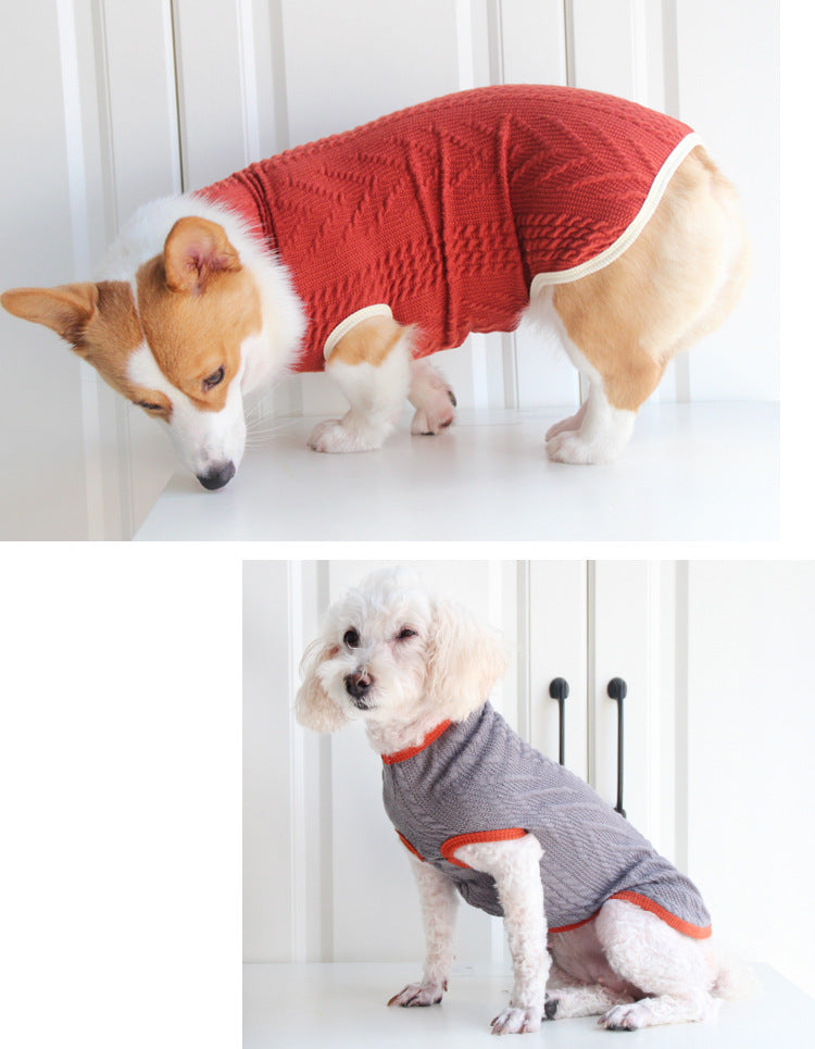 Red cable-knit pet sweater with white trim and small logo patch