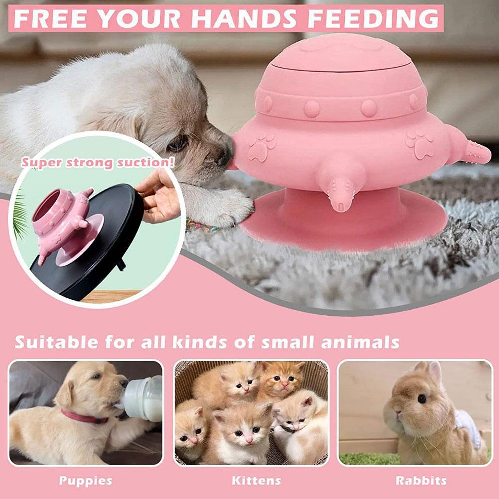 Pink silicone pet milk nursing feeder with suction cup base and open lid