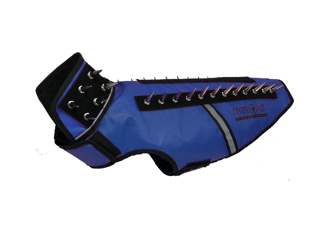 SpikeVest spiked vest with black side panels, royal blue body, and metal spike row on top