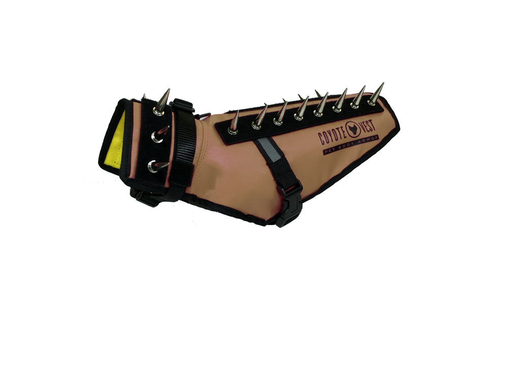 Tan spiked dog safety vest with black strap closure and metal prongs