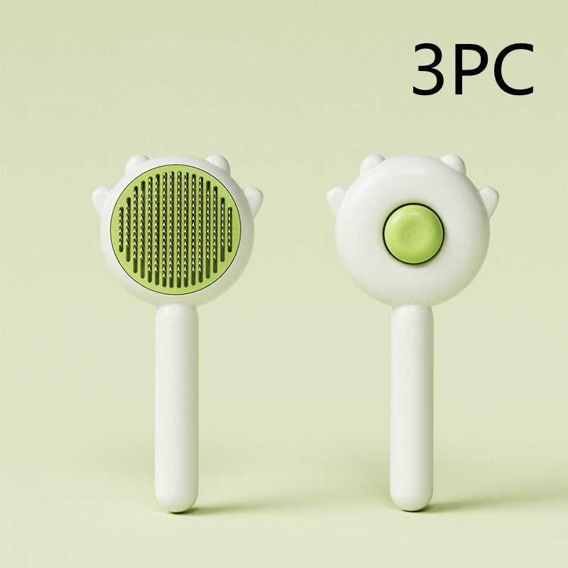 Pet grooming comb brush with green round pin massage head and white handle